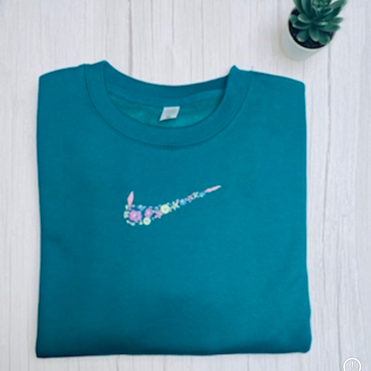 Beautiful Adults hand embroidered floral sweatshirt.